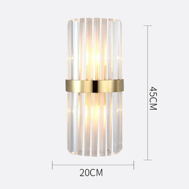 Modern gold crystal wall lamp featuring vertical crystal rods and a gold-toned metallic band for living room use