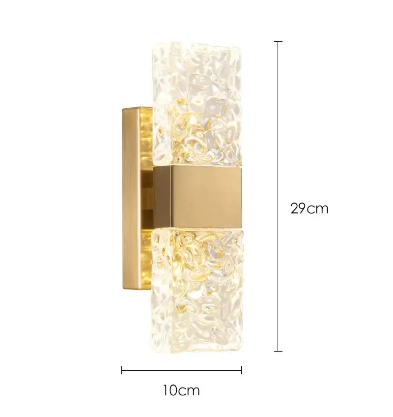 Modern gold crystal wall lamp with textured translucent glass panels and central metallic accent for living room decorbites crystal wall lamp