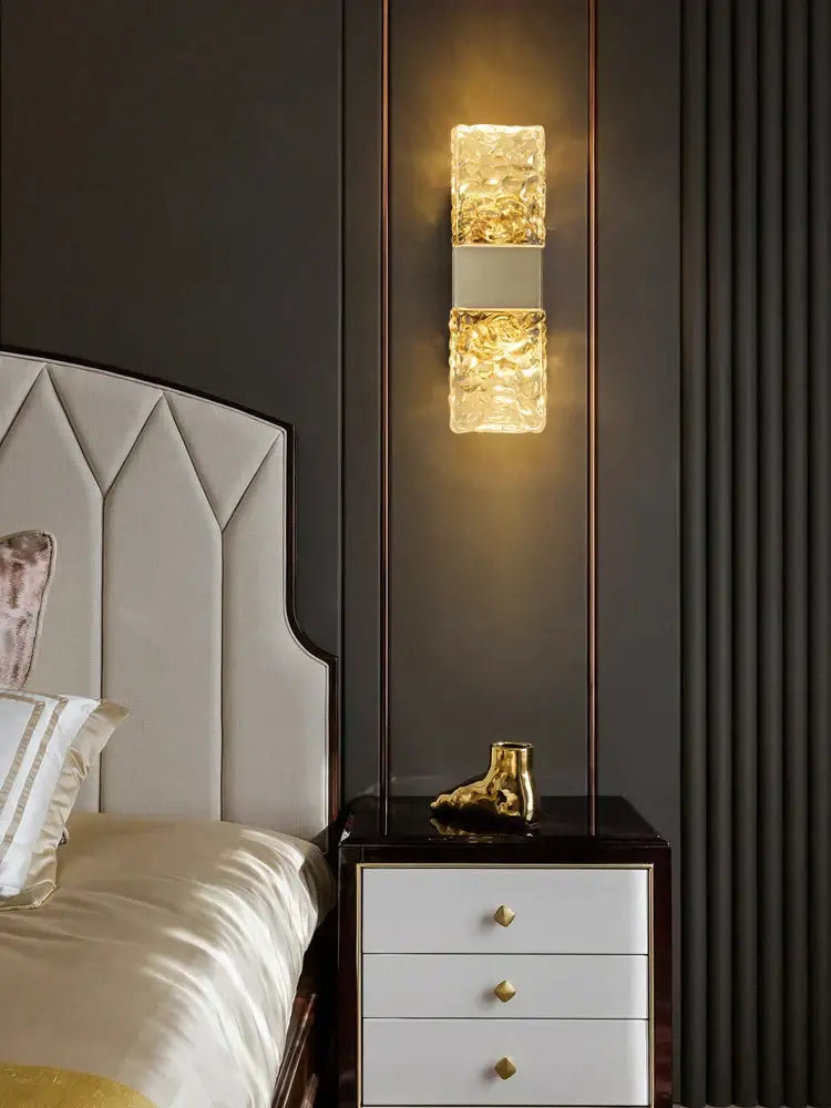 Modern gold-toned crystal wall lamp featuring textured glass sconce perfect for elegant living room decorbites crystal wall lighting