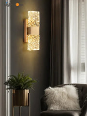 Modern gold crystal wall lamp with textured glass sconce emitting warm light perfect for living room decorbites crystal wall