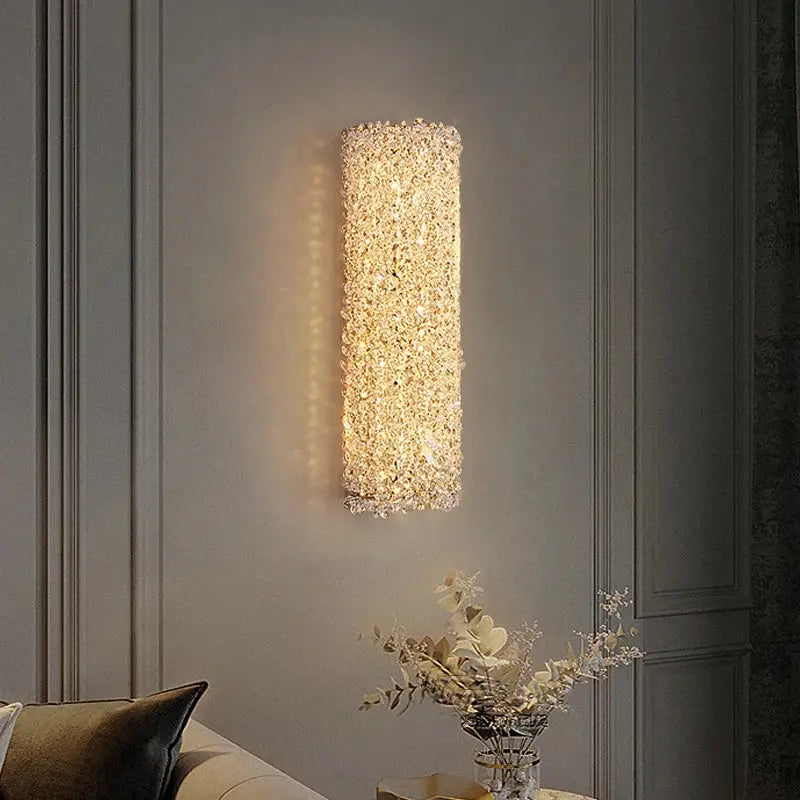 Modern gold crystal wall lights sconce with clear sparkling crystals emitting warm golden glow for bedroom night light decorbites crystal wall