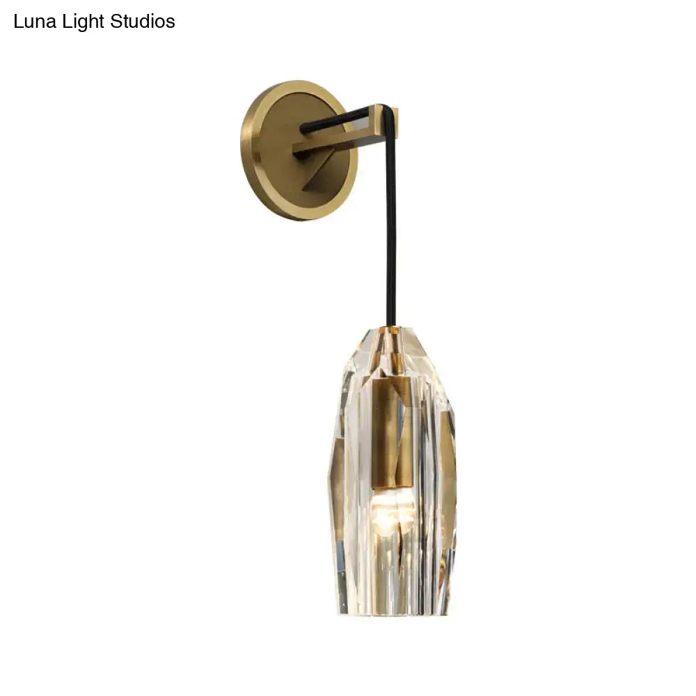 Modern gold crystal wall sconce with faceted shade and brass accents for direct wired electric bedroom lighting