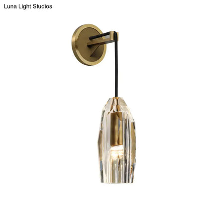 Modern gold crystal wall sconce with faceted shade and brass accents for direct wired electric bedroom lighting