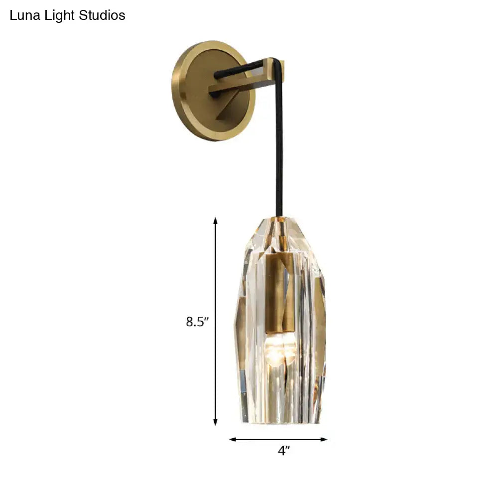 Modern gold crystal wall sconce with faceted glass shade and black cable for direct wired electric bedroom lighting