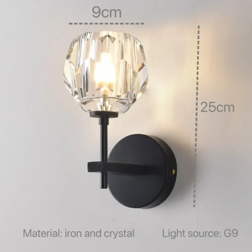 Modern gold crystal wall sconce with black iron and faceted clear glass globe by decorbites crystal wall fixture
