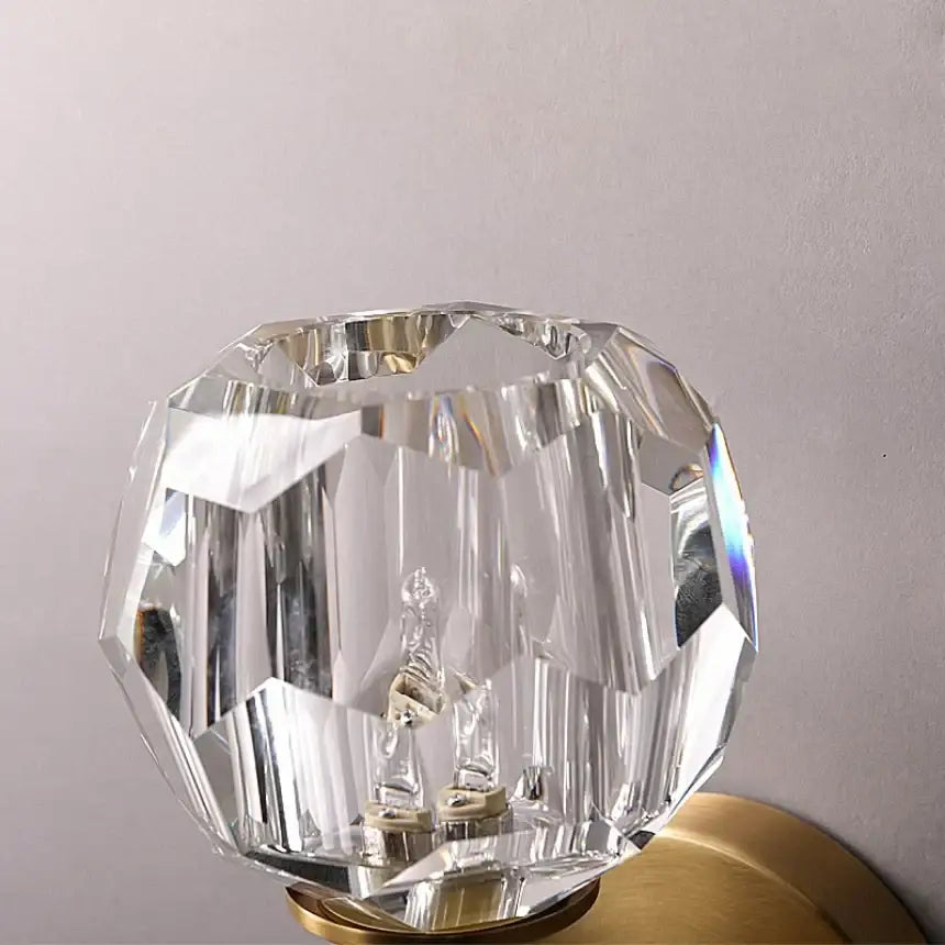Modern gold crystal wall sconce with clear faceted crystal lampshade and polished brass base for bedroom decorbites crystal wall