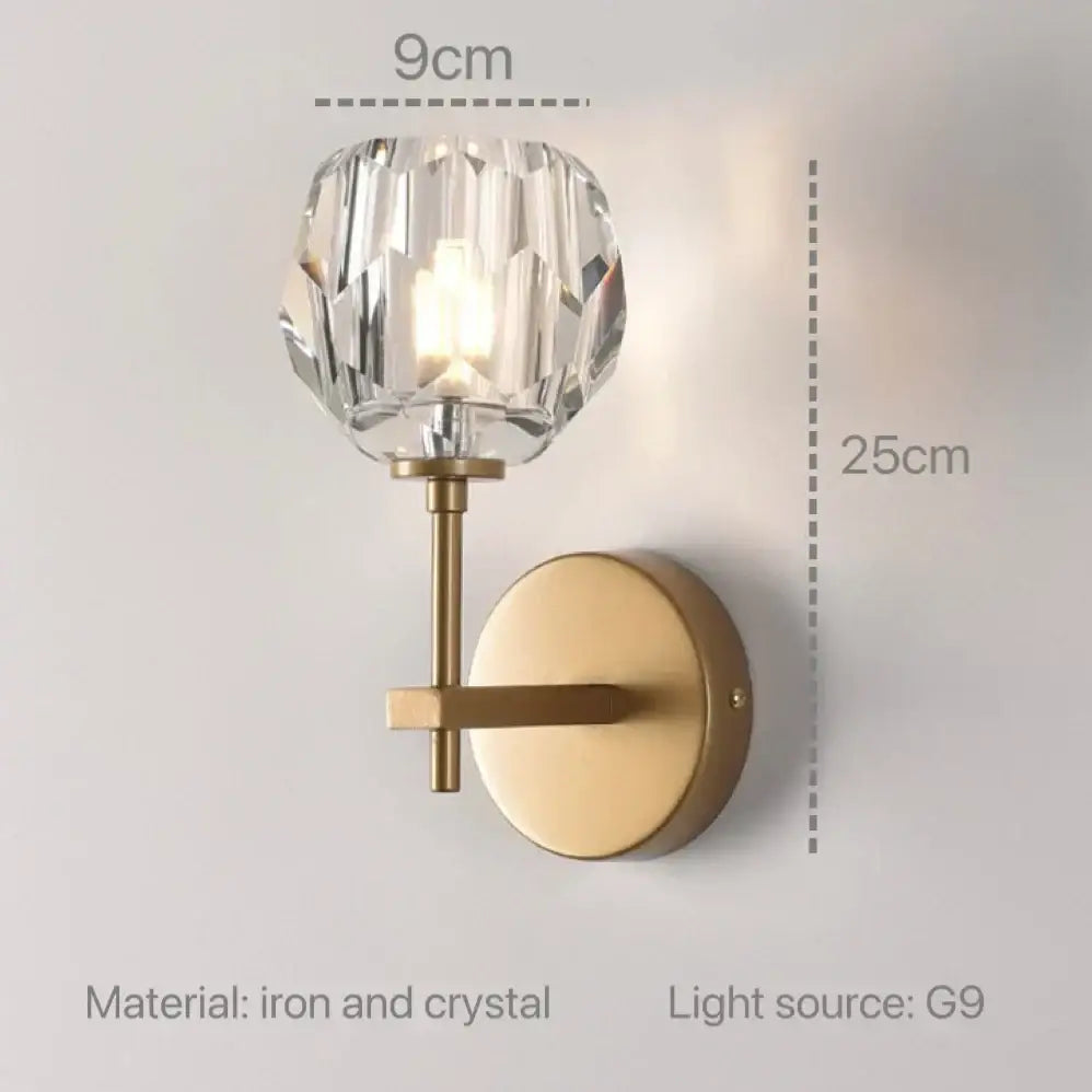 Modern gold crystal wall sconce with faceted 9cm crystal globe on brass stem 25cm long for decorbites crystal wall lighting