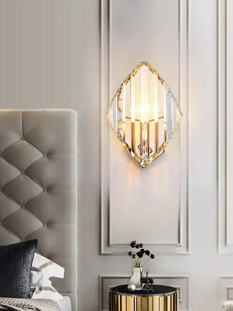 Modern gold crystal wall sconce with diamond-shaped gold metal frame and clear crystal panels for bedroom luxury decorbites crystal wall