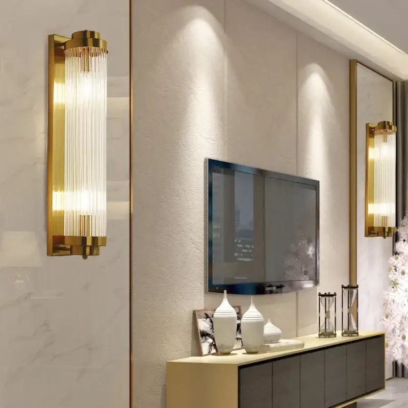 Modern gold crystal wall sconce lamp with vertical crystal prisms for elegant bedroom decorbites crystal wall lighting