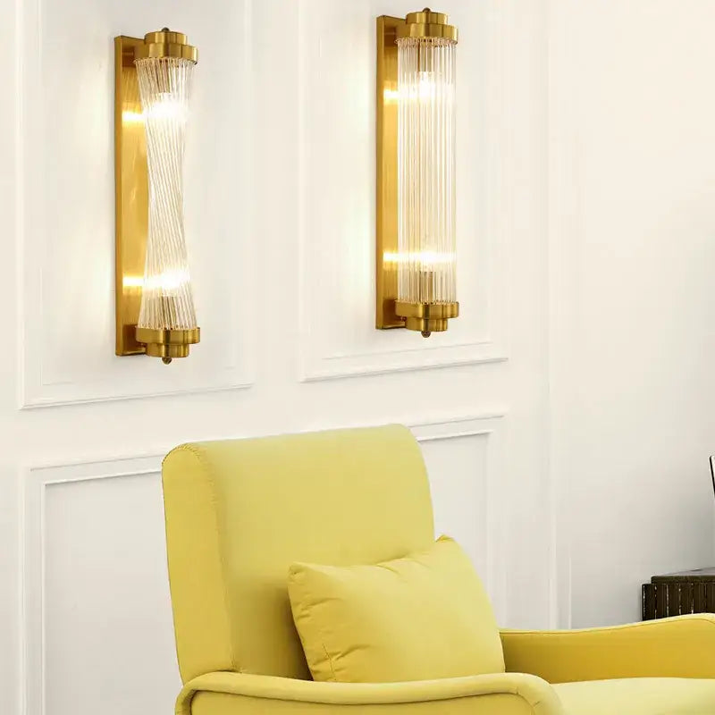 Modern gold crystal wall sconce lamp with vertical glass prisms for bedroom lighting by decorbites crystal wall