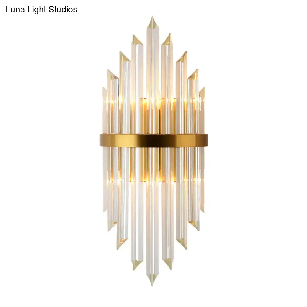 Modern gold wall sconce with clear crystal rods in a radiant fan pattern for living space 110v-120v lighting