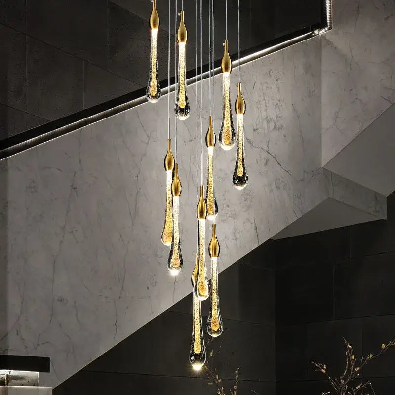 Elegant gold and black teardrop crystal water drop chandelier with modern cascading design for bedroom decorbites crystal water