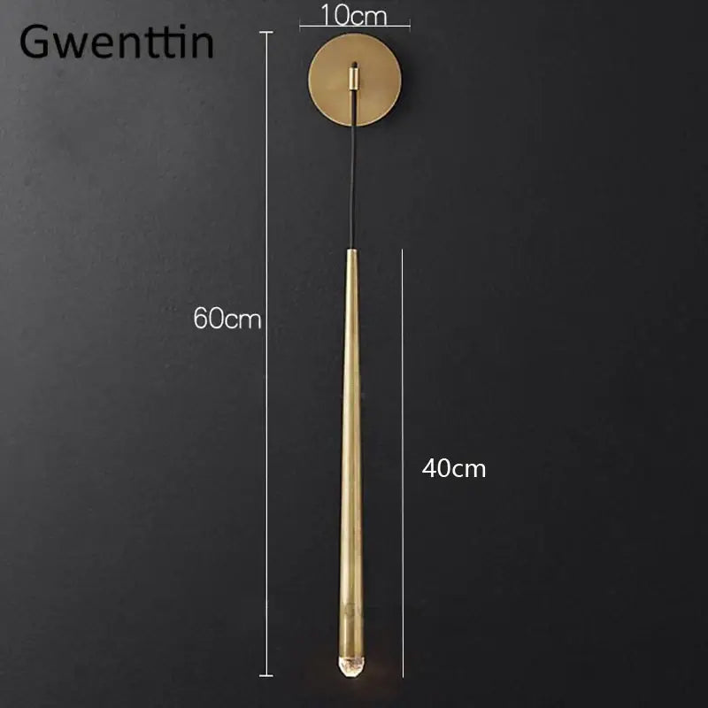 Gwenttin brass wall sconce with sleek cylindrical design and clear bulb for modern gold crystal water drop decorbites crystal water lighting