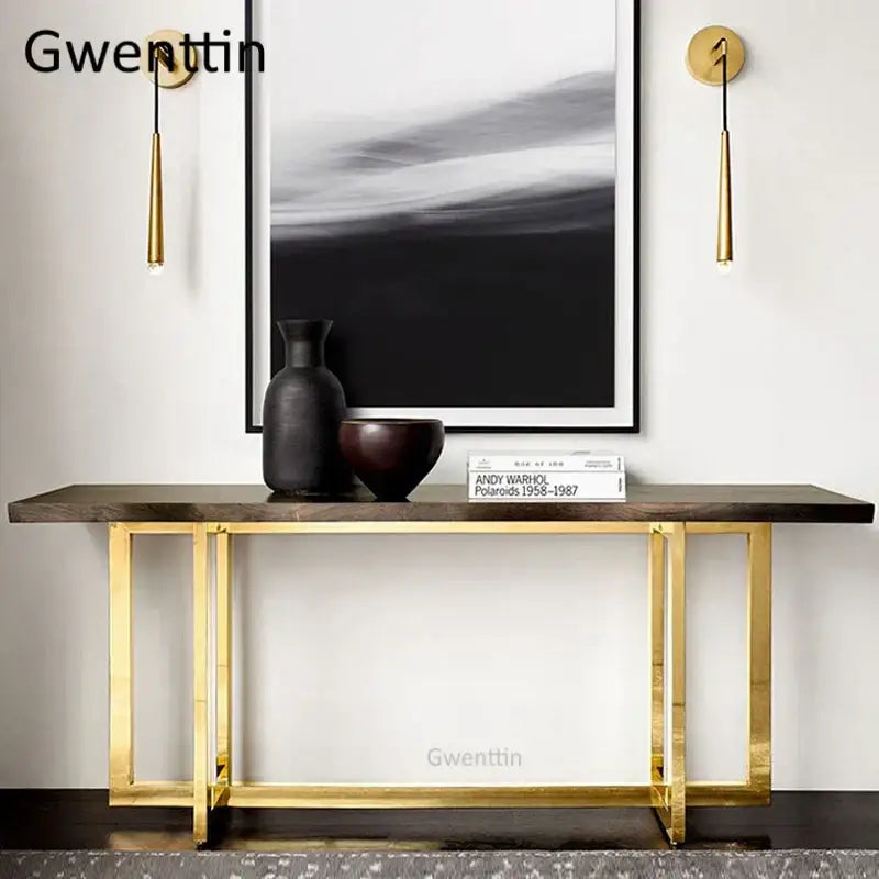 Modern gold crystal water drop wall sconce with led mirror light above a gold-framed console table with dark wood top