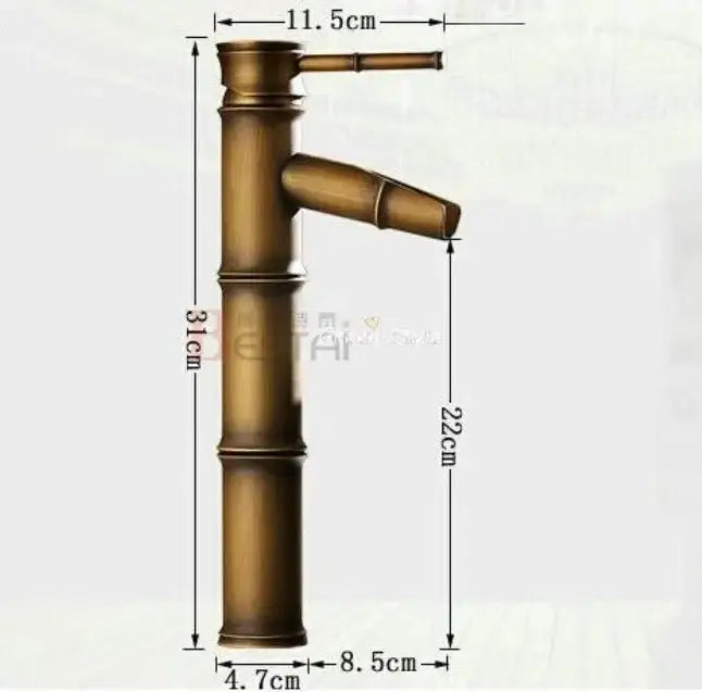 Brass bamboo-style basin faucet with segmented design and curved spout in modern gold crystal wine glass decorbites crystal wine design