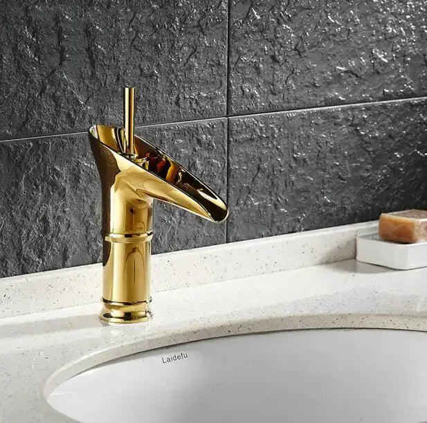 Modern gold crystal wine glass basin faucet with sleek waterfall design and brushed metallic finish by decorbites crystal wine