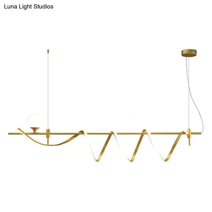 Modern gold curve island light pendant with sleek wave design and integrated led lighting for kitchen use