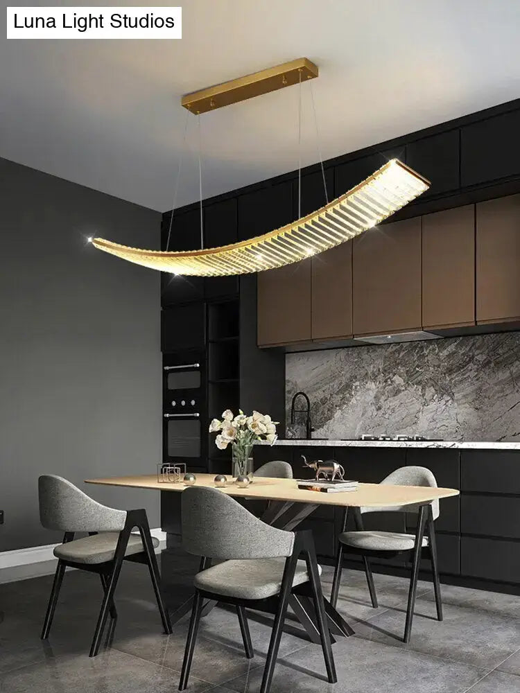 Modern gold curved crystal chandelier with warm led illumination as a suspended crystal chandelier for dining room