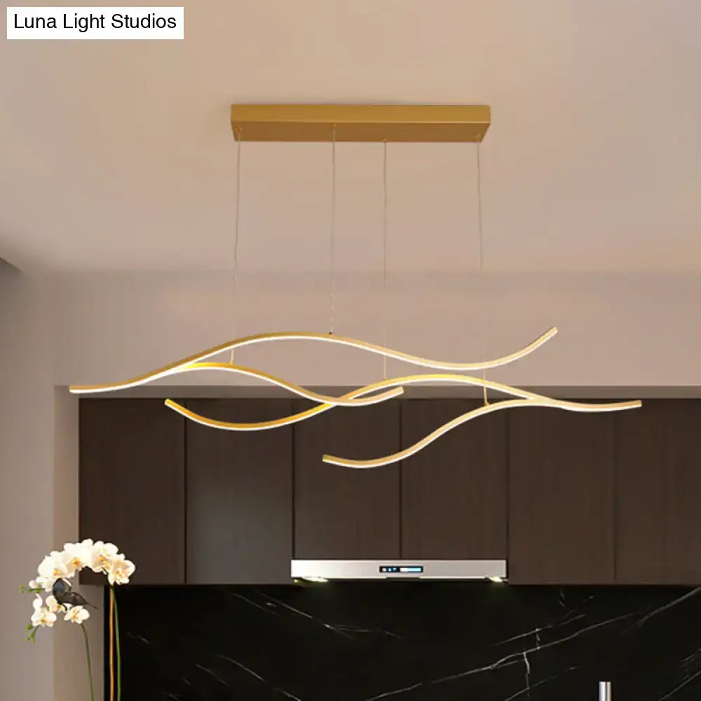 Modern gold curved led metal pendant light with wave-like strips suspended from a rectangular ceiling mount lighting fixture
