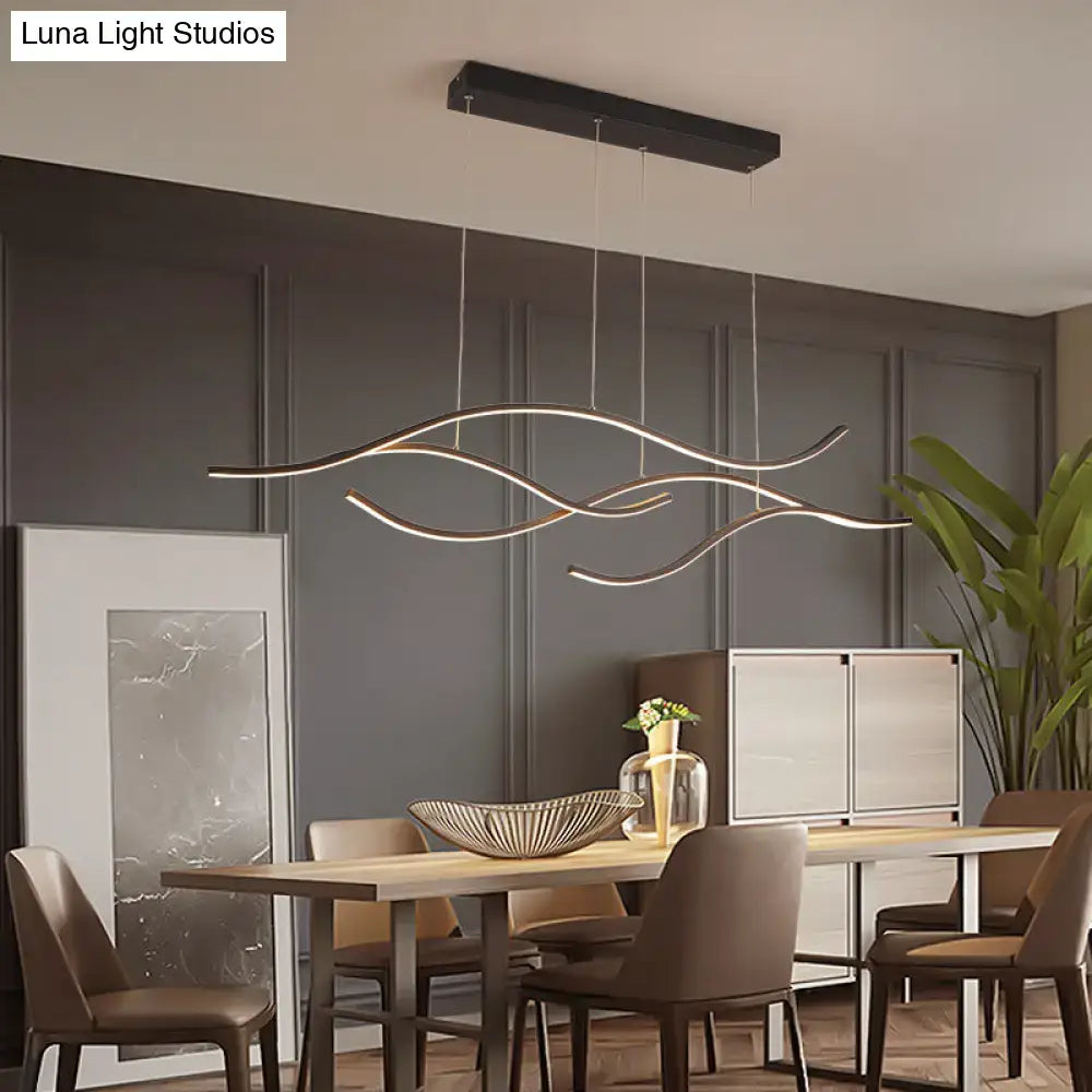 Modern gold curved led metal pendant light with black rectangular ceiling mount and flowing pendant light fixtures