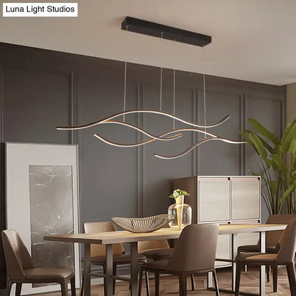Modern gold curved led metal pendant light with black rectangular ceiling mount and flowing pendant light fixtures