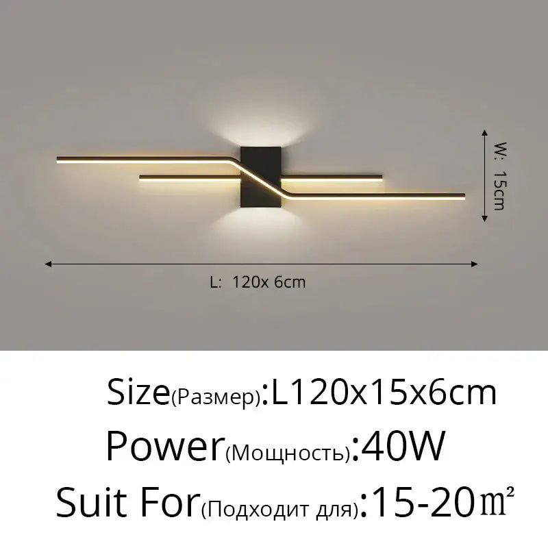 Modern gold curved led wall lamp with sleek black and gold metallic arms emitting warm ambient light for bedroom