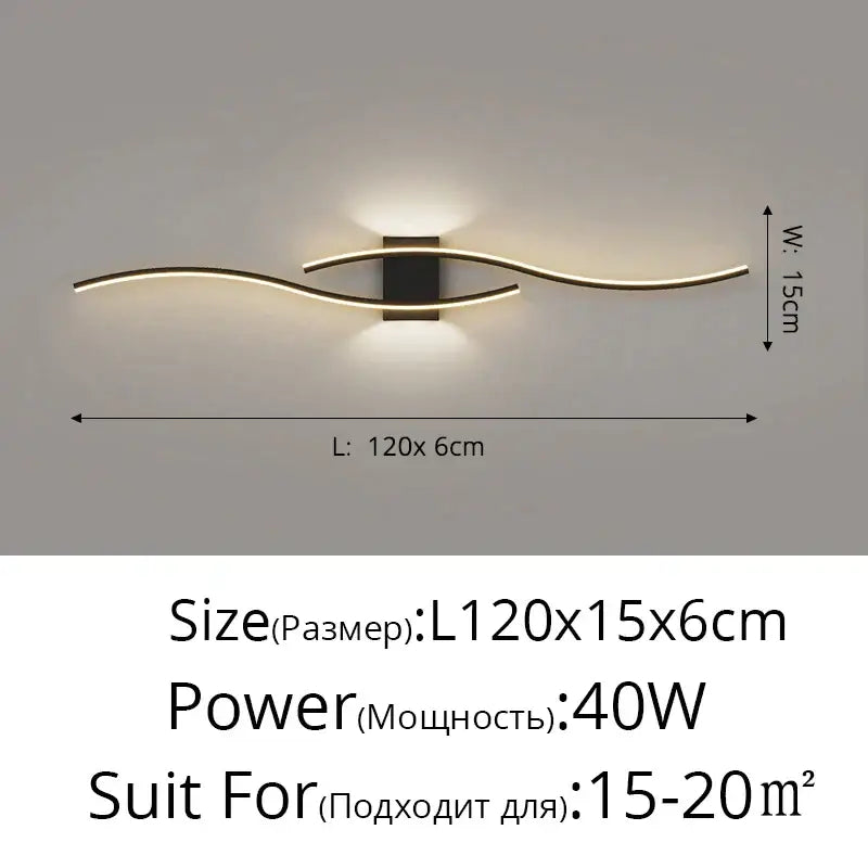 Modern gold curved led wall lamp with sleek curved arms and black rectangular housing for bedroom ambient light