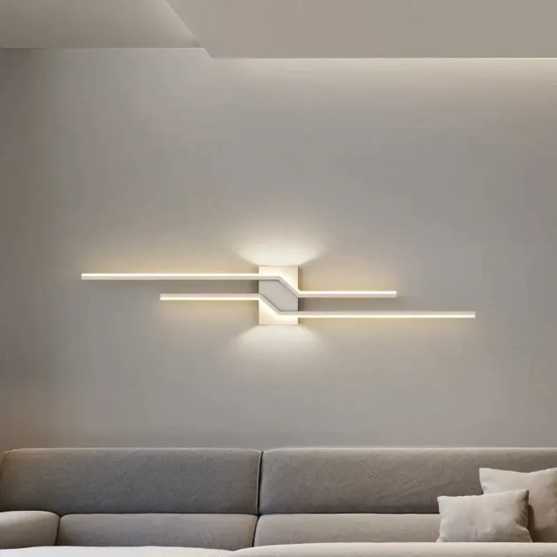 Modern white led wall lamp with sleek intersecting horizontal bars and minimalist geometric design for ambient bedroom lighting