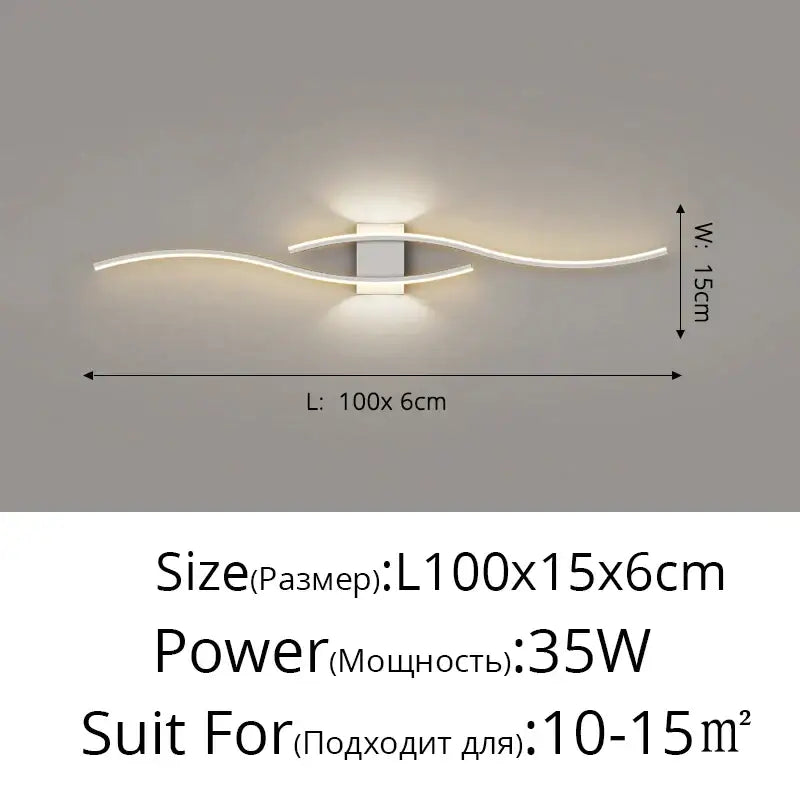 Modern white led wall sconce with sleek curved arms and central rectangular fixture as ambient bedroom led wall lamp