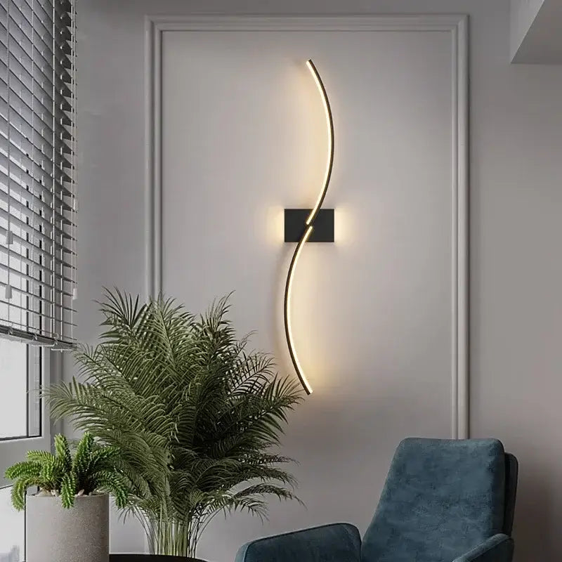 Modern gold curved led wall lamp with sleek design and black base perfect for living room decorbites led wall lamp