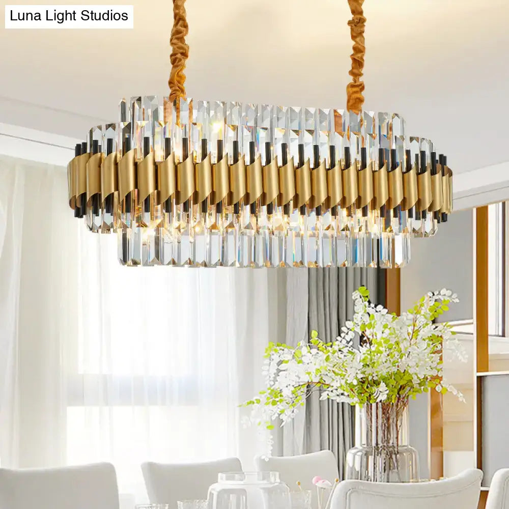 A modern DecorBites™ gold cut crystal chandelier with a metallic frame and twisted rope suspension chains