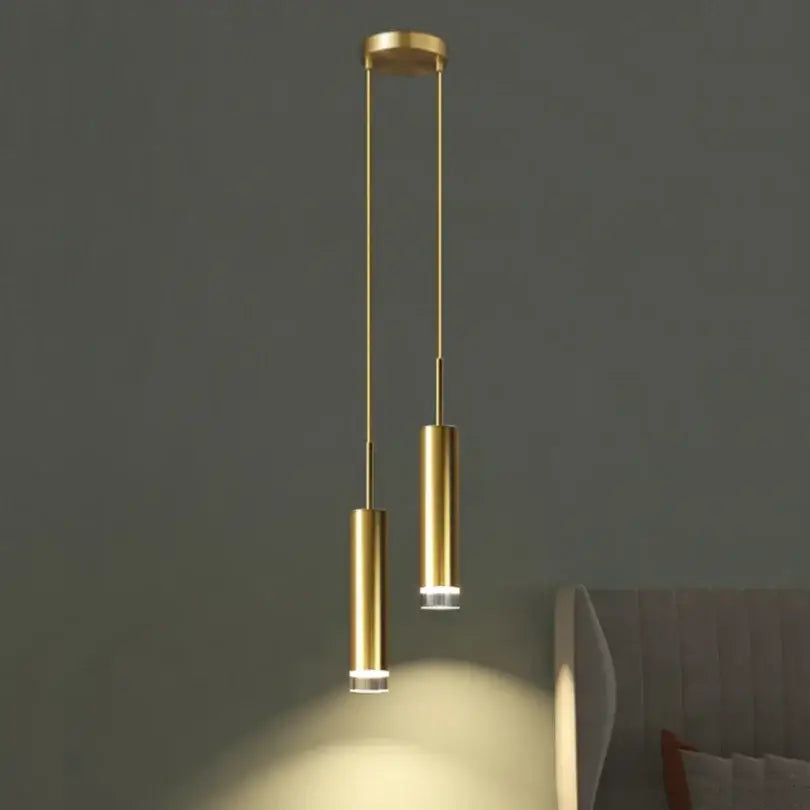Modern gold cylindrical led pendant light with frosted glass accents for bedroom decorbites gold modern lighting