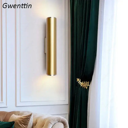 Modern gold cylindrical wall sconce light fixture with sleek design for stylish living room wall sconce lighting