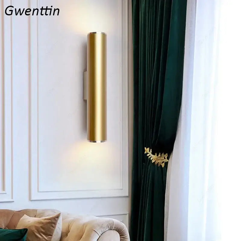 Modern gold cylindrical wall sconce light fixture with sleek design for stylish living room wall sconce lighting