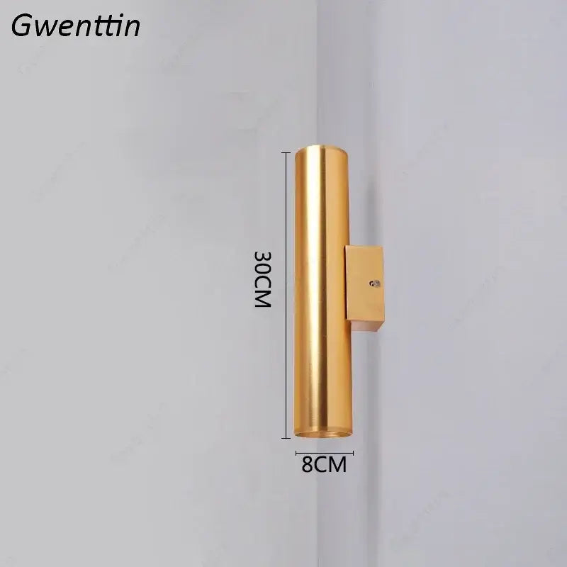 Modern gold cylindrical wall sconce light fixture with sleek metallic finish and rectangular mounting bracket for living room