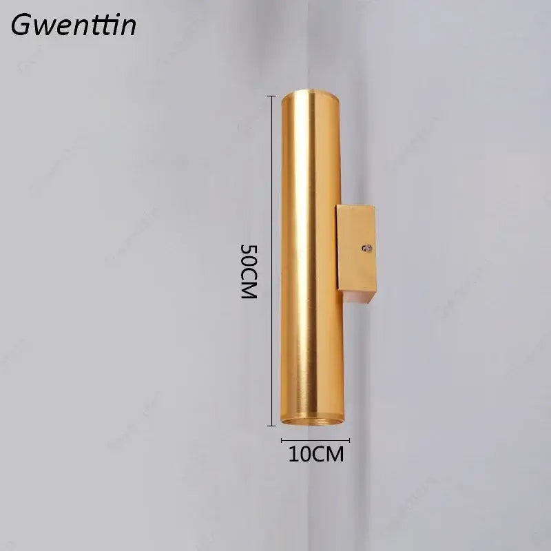Modern gold cylindrical wall sconce light fixture with sleek metallic finish and rectangular mounting bracket for living room