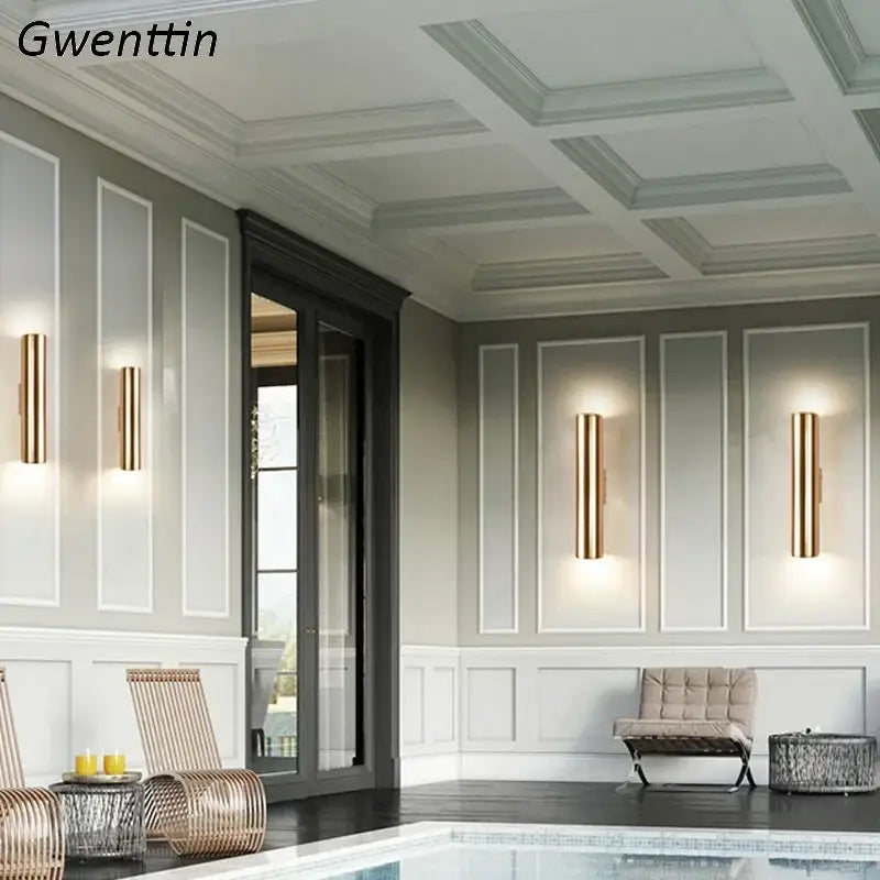 Modern gold cylindrical wall sconce light fixture with a sleek design for living room wall sconce lighting