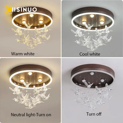 Modern gold dancing girl led chandelier with bronze base and crystal bird ornaments featuring adjustable warm and cool lighting
