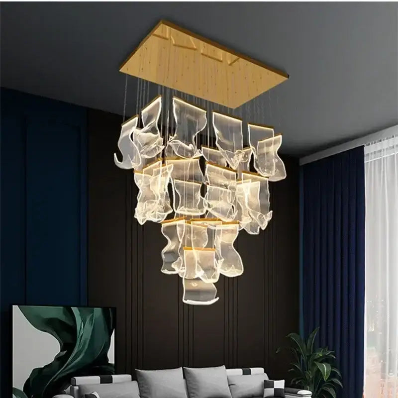 Modern gold decorbites acrylic leaf chandelier with a golden wooden frame and cascading translucent glass for dining room light