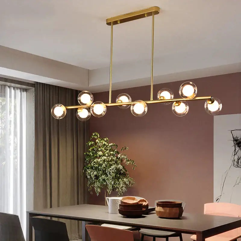 Modern gold decorbites bubble ball led hanging chandelier with sleek horizontal bar and spherical glass bulbs for dining room