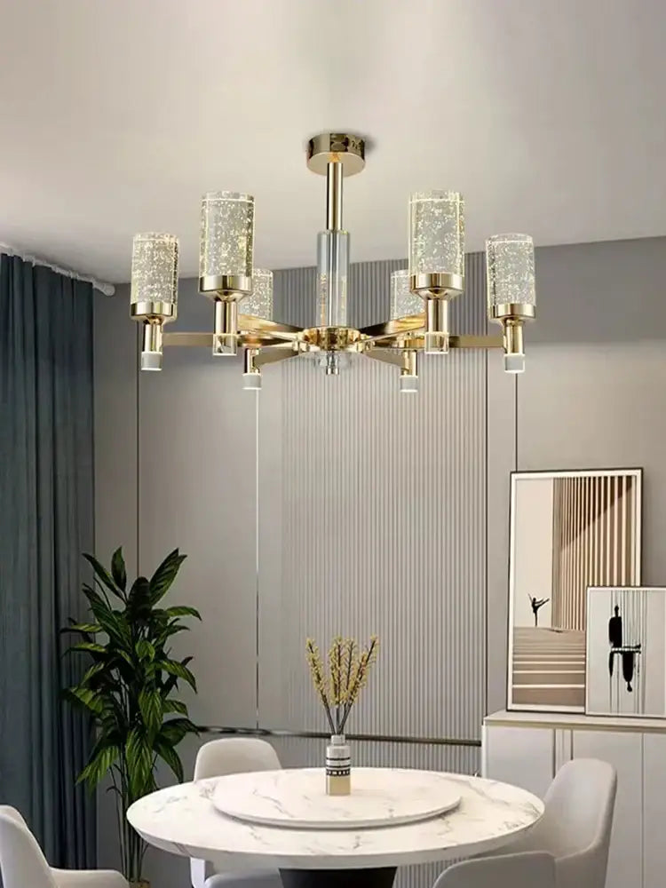 Modern gold decorbites bubble crystal chandelier with gold-toned cylindrical shades for living room lighting