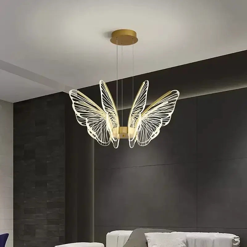 Gold-toned decorbites butterfly modern pendant light with illuminated delicate wireframe wings for dining room decor