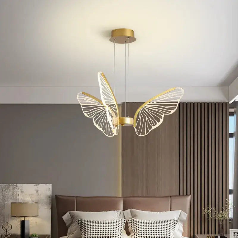 Modern gold decorbites butterfly pendant light with translucent wings and minimalist design for dining room use