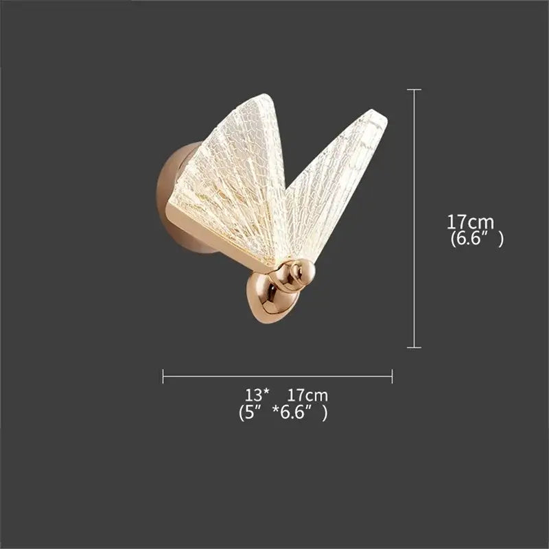 Gold-toned decorbites butterfly wall light with translucent crackled glass wings and polished metallic body for bedroom decor