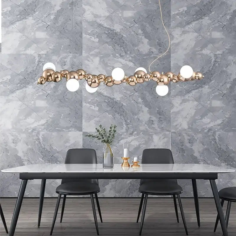 Modern gold decorbites caterpillar metal ball pendant light with frosted glass globes and polished spheres for dining room