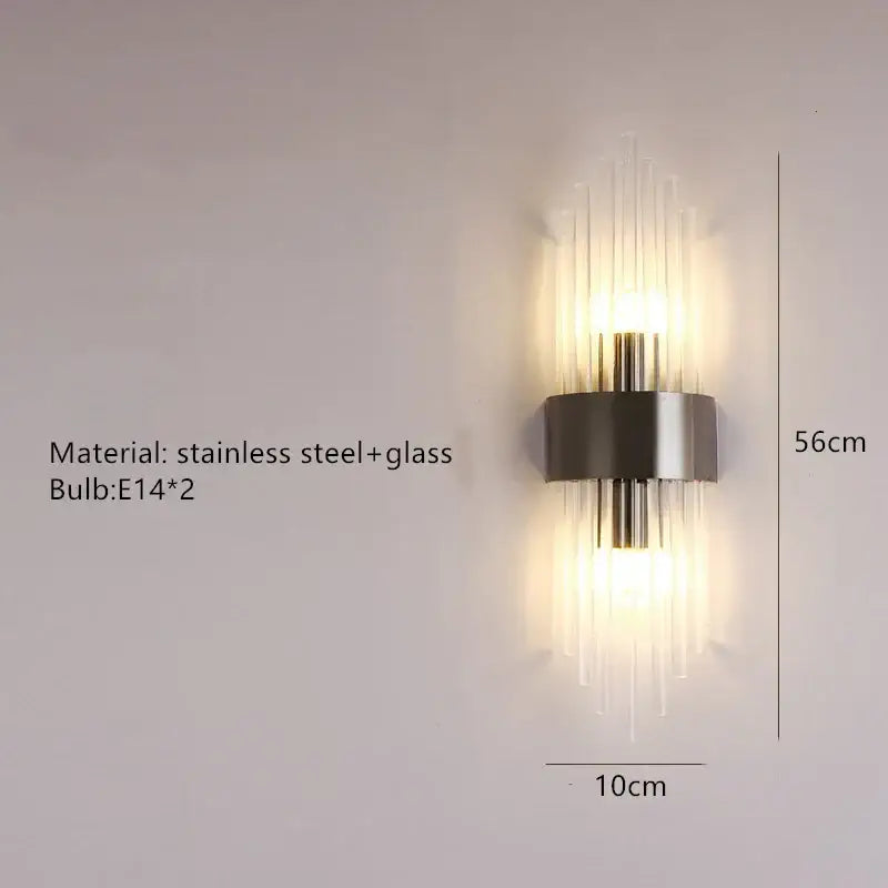 Modern gold decorbites clear crystal led wall lamp with stainless steel frame and clear crystal rods emitting warm light