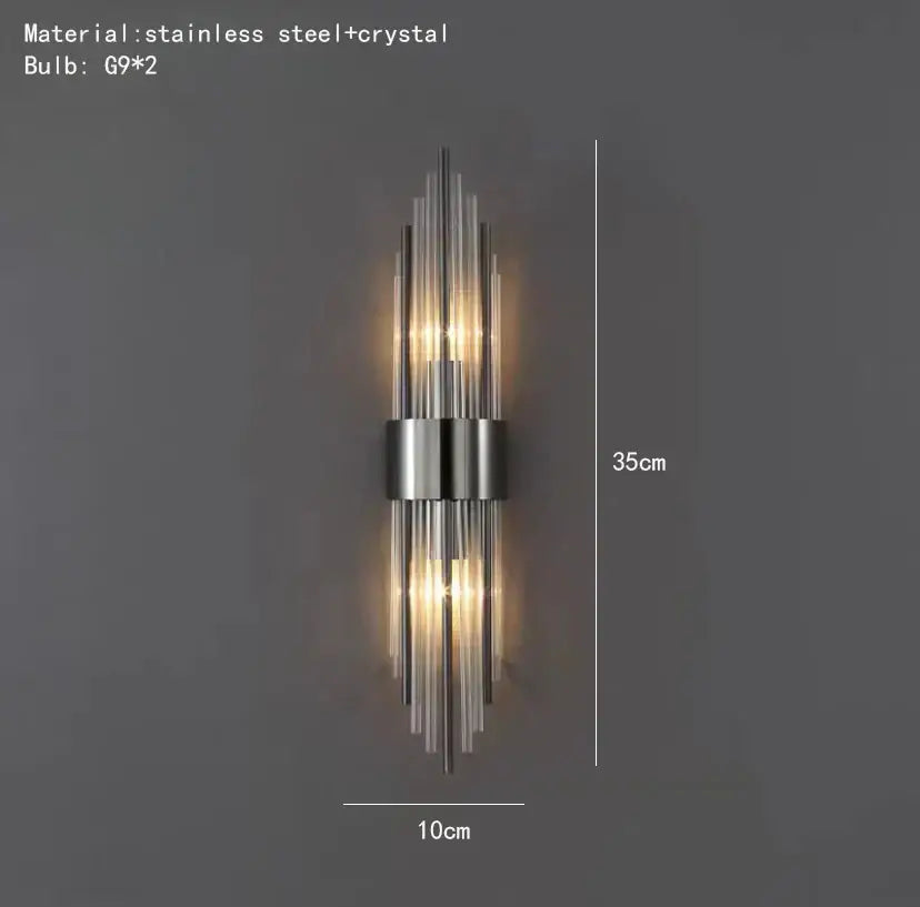 Modern gold decorbites clear crystal led wall lamp with sleek stainless steel frame and vertical crystal rods for bedroom sconce