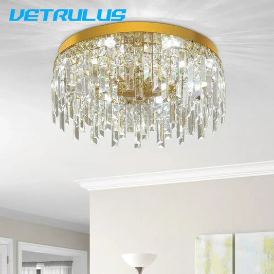 Modern gold decorbites crystal ceiling chandelier with cascading clear crystal prisms for dining room lighting