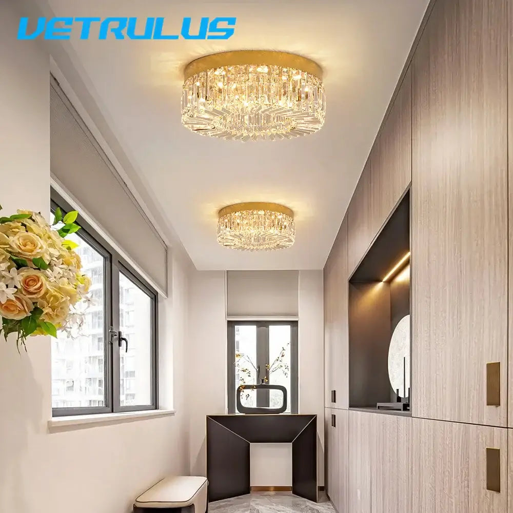 Modern gold decorbites crystal ceiling chandelier with circular design and multiple hanging facets for dining room
