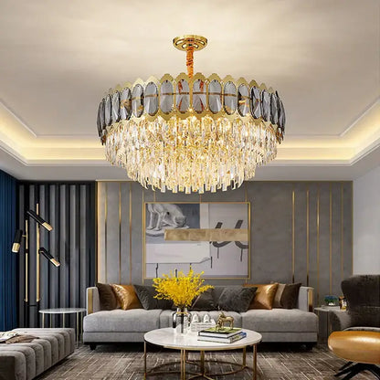 Modern gold decorbites crystal ceiling chandelier with cascading crystal droplets and a faceted glass circular frame